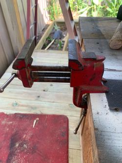 vintage cast iron clamp-on bench vise, commonly used for small hobbyist projects.