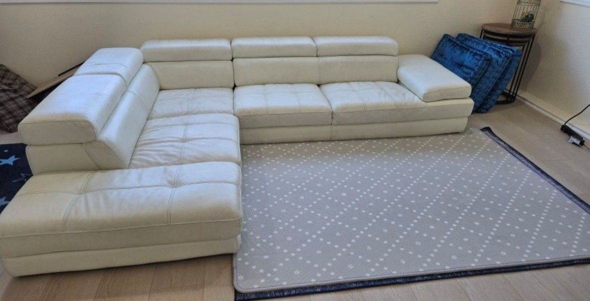 100% Leather L Shape Couch .