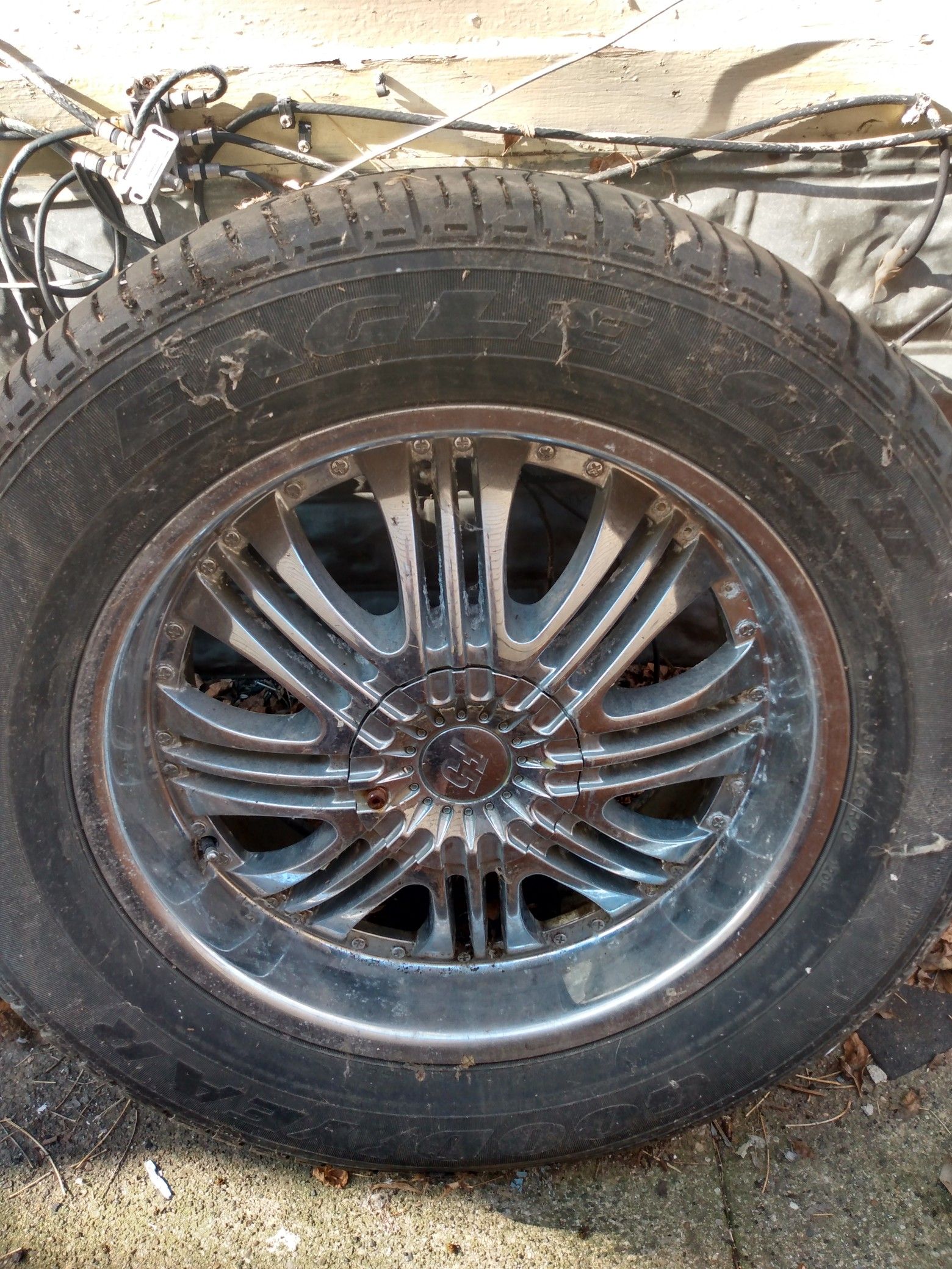 6 lug GM Chevy suburban rims needs 1 cap and 1 tire...$450 obo