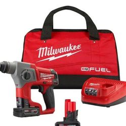 Milwaukee Battery Rotary Hammer Drill W/ 3 Batteries And A Charger
