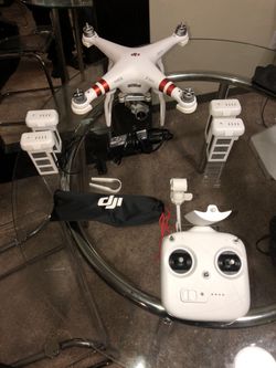 DJI phantom 3 with 8G memory card and other accessories.