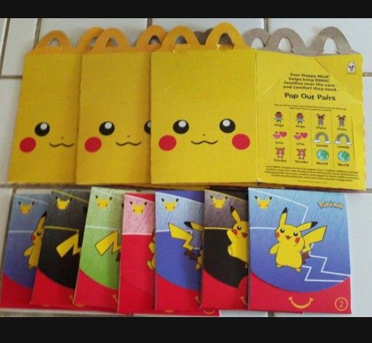 Pokemon Cards And Pikachu Happy Meal Boxes