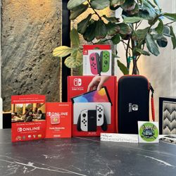 Nintendo Switch Oled Bundle 256sd Card 1 Year Online Carrying Case And Extra Controller Joy Stick 
