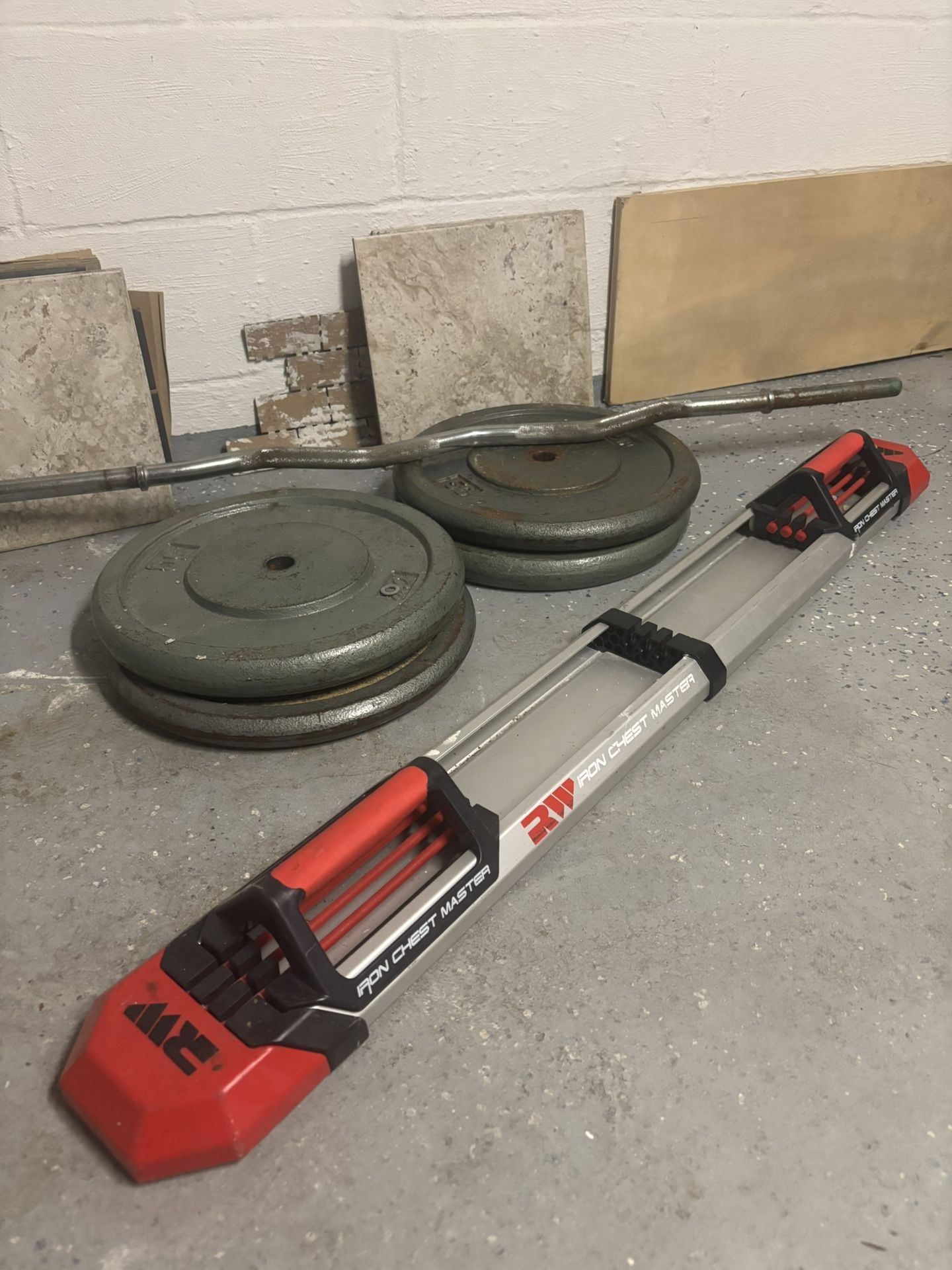 4x 50 Lb Plates And Curl Bar And A Iron Chest Master