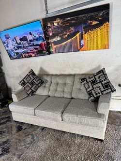 * Like New * Ashley Furniture 1pc modular gray sofa ( Free Delivery )