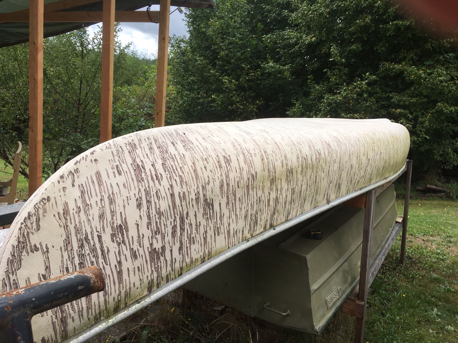 Vintage 17 ft Sears canoe