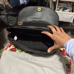 Charles and Keith black flap handbag with shoulder strap