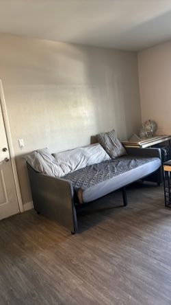 Couch/bed gray with shelves/cup holder