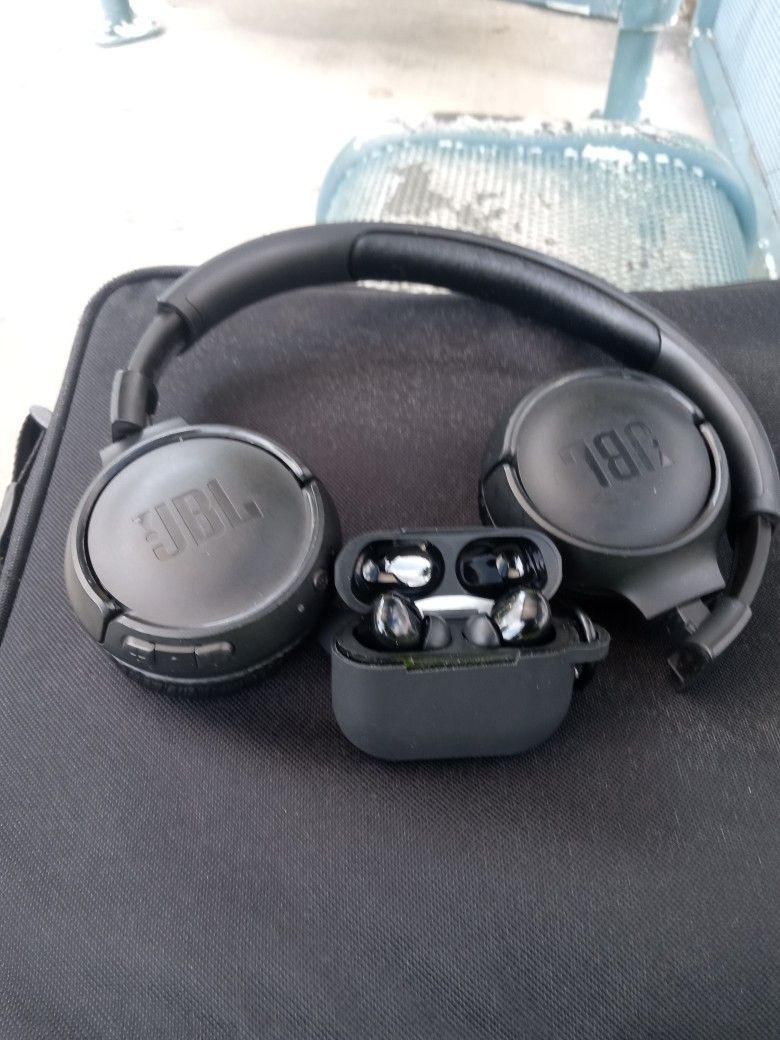 in the first picture is a pair of JBL WIRELESS HEADPHONES AND A PAIR OF PRO BUDS WIRELESS EARBUDS AND A SIZE 13 NIKE AIR MAX