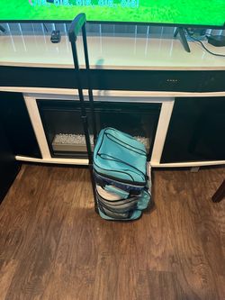 Soft-sided Tommy Bahama rolling cooler bags