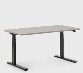 Adjustable standing or sitting desk