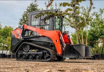 KUBOTA AND DUMP TRAILER