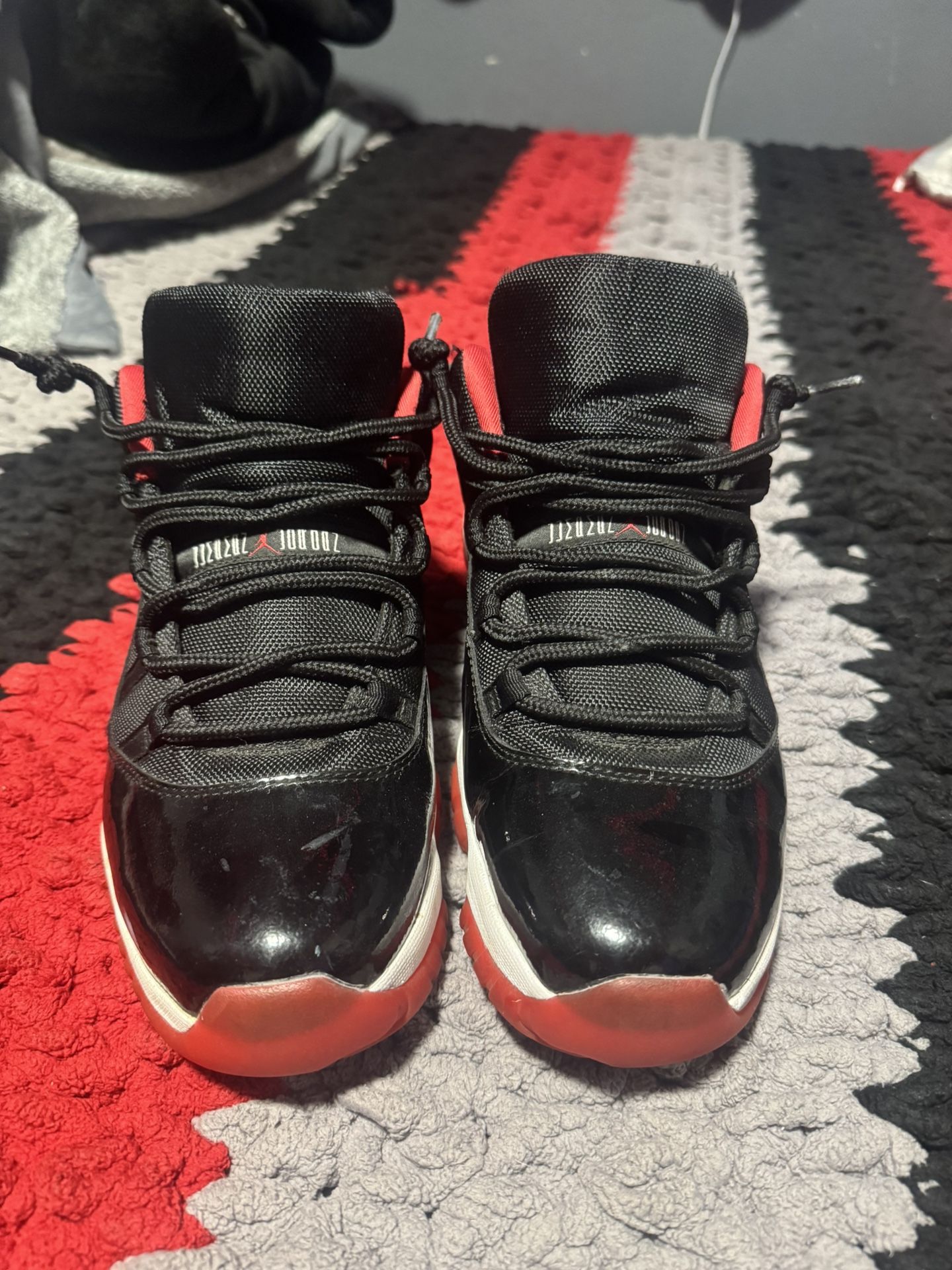 Jordan 11 Low Breads