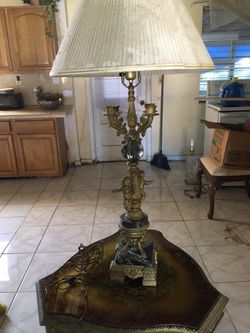 Antique wooden and carved lamp