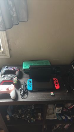 Nintendo switch with everything it comes with plus controllers