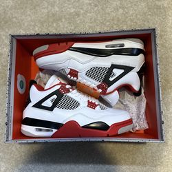 Fire red Jordan 4s