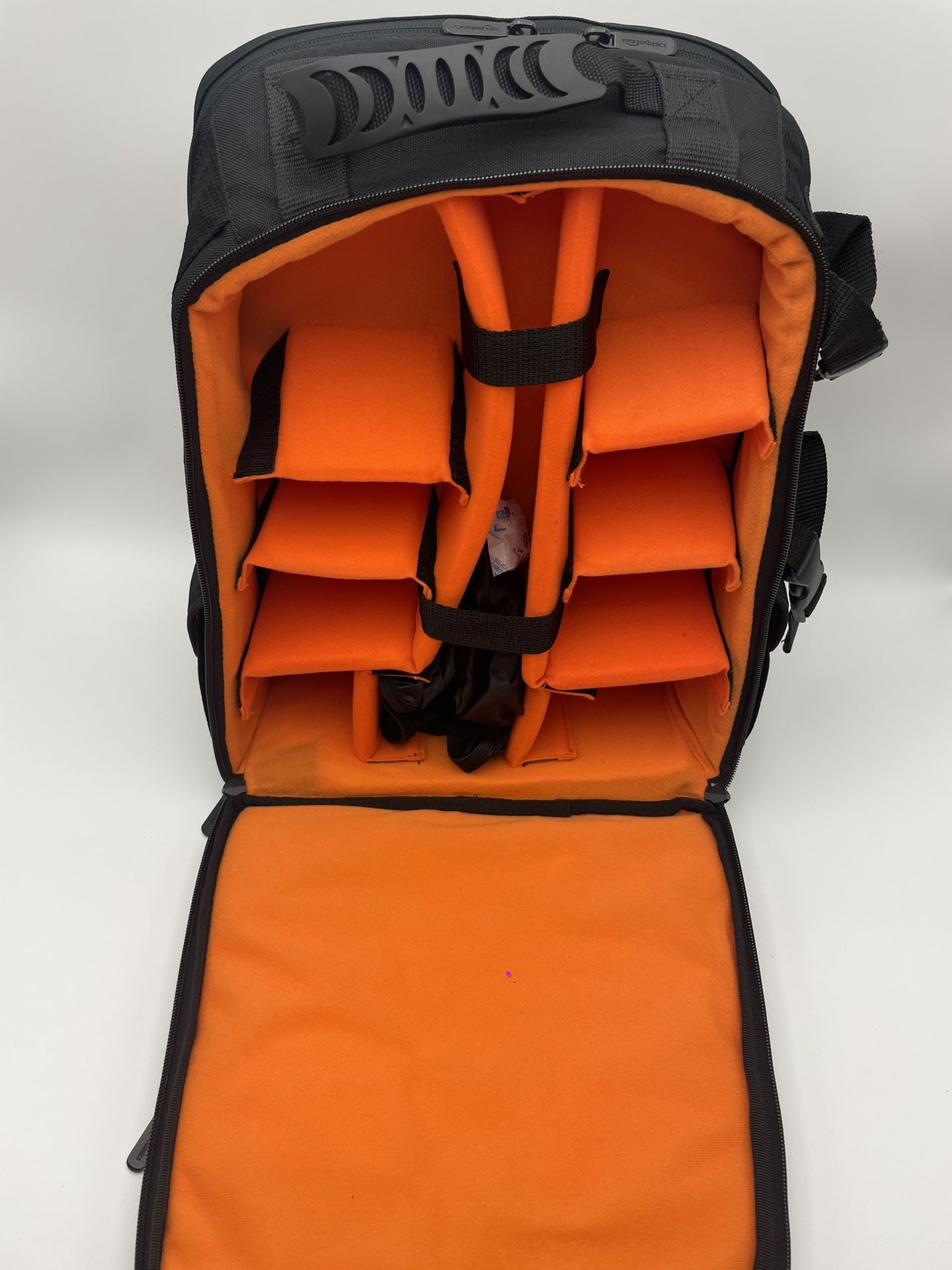 Amazon Basics DLSR and Laptop Backpack (Orange Interior)