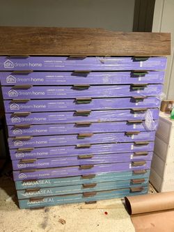 56 Sealed Boxes of Laminate Flooring – 1,031 Sq Ft