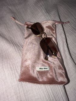 Miu Miu Sunglasses With Mauve Lenses