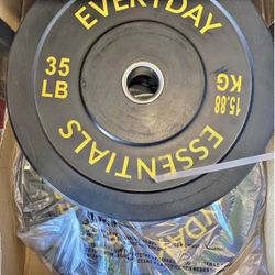 A pair of 35 bumper weights new still in the box