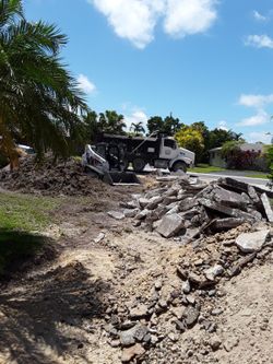 Excavation bobcat materials dump truck