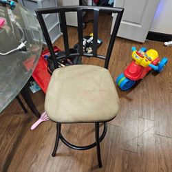 Tall round glass table with 3 stools