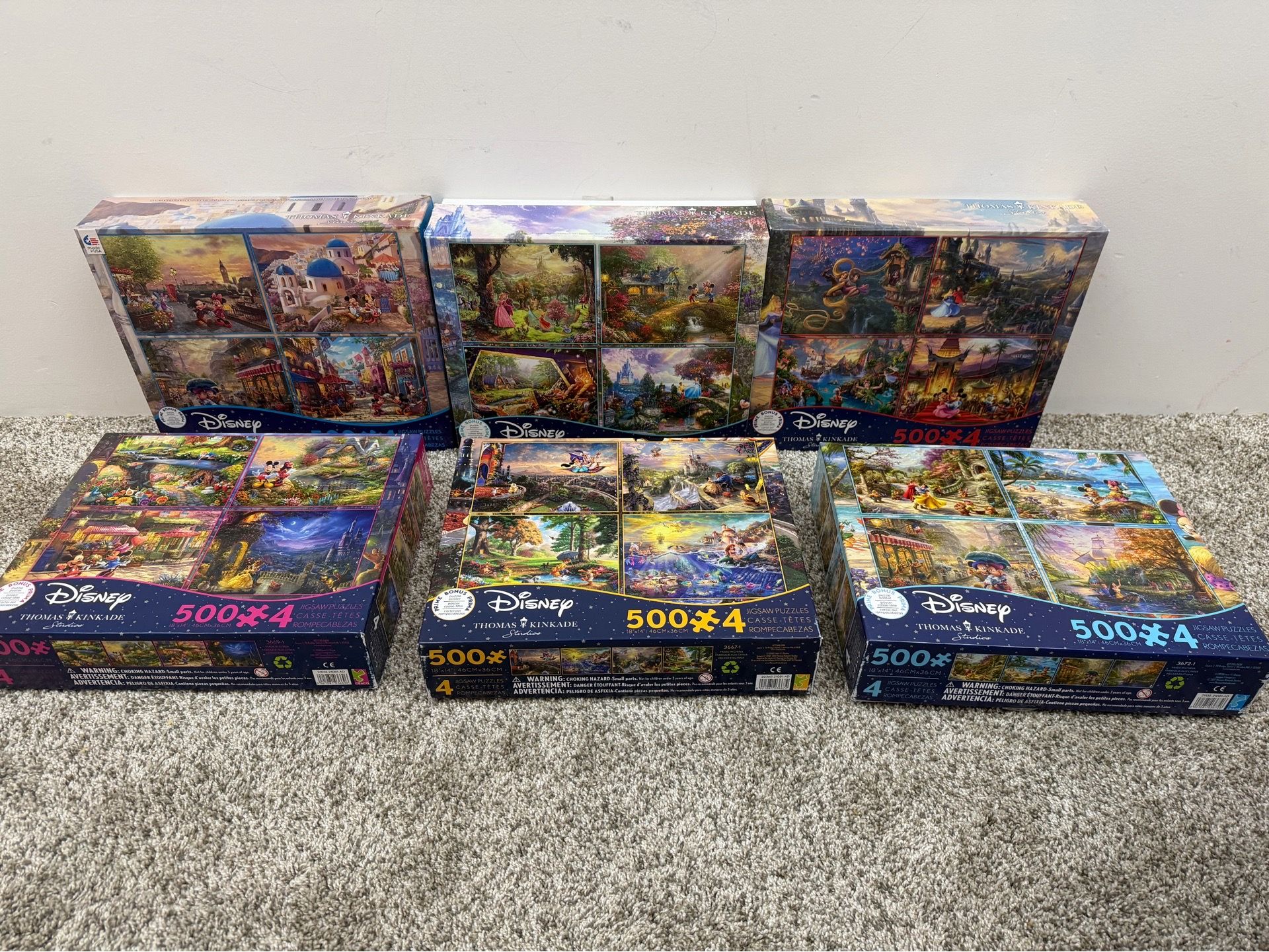 Thomas Kincaid Disney puzzles