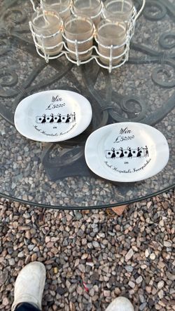 Two vintage ashtrays from the 30s and 50s give away sweet steak hospital
