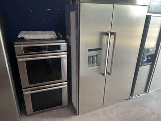 Thermidor stainless steel refrigerator and double wall oven