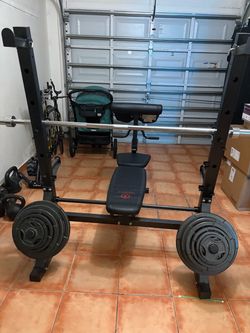 Bench and weights with Olympic bar
