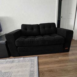 Black corduroy convertible loveseat