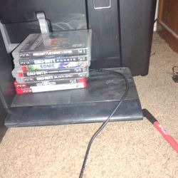 PS3 With Games And HDMI Cord