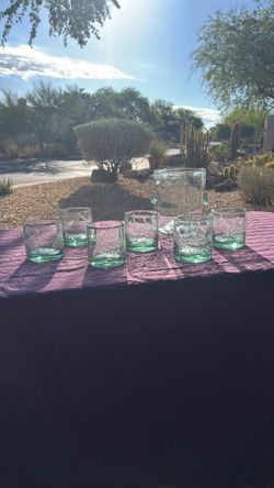 Handblown vintage glass tumblers and glass ice bucket.