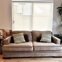 Comfy 3-Seater Beige Suede Sofa with Striped Pillows