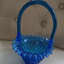 Fenton hobnail art glass basket.