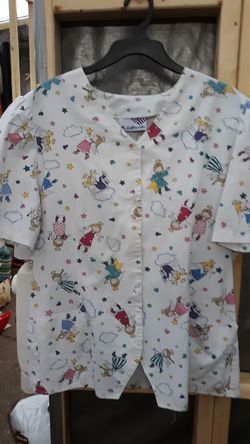 Scrub shirt looks like a size small to medium