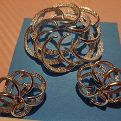 Sarah Coventry,  Signed, Antique Textured Swirl Brooch And Clip-on Earrings. Silver Tone