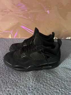 Black Cat Jordan 4’s