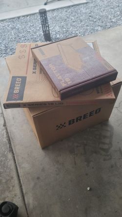 Brand new in box x19 breeo smokeless fire pit corten steel, lid, & flat top griddle way better Solo
