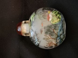 Tobacco bottle, hand-painted inside.