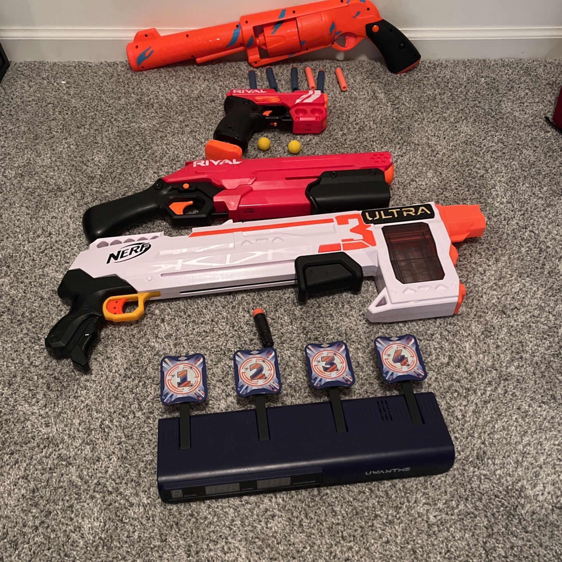 4 Nerf Guns For Cheap Including A Target Practice Thing. (see Description)