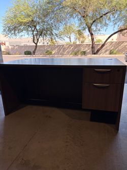 Office desks, chairs, files, credenzas.
