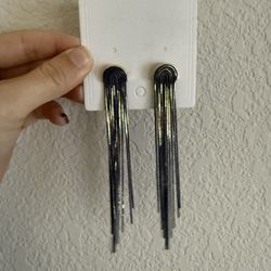 Women’s blue and gold tassel earrings