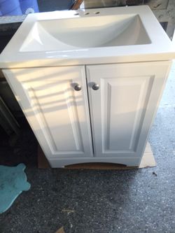 BATHROOM SINK AND CABINET