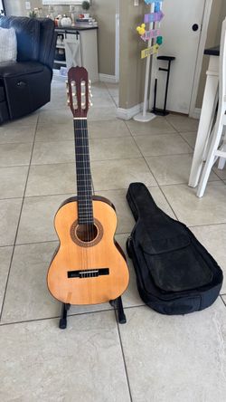 Guitar with stand and case