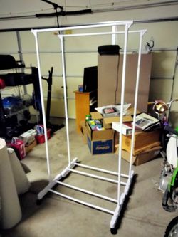 2/ White Clothing Stands for Laundry or Air Drying. On Wheels