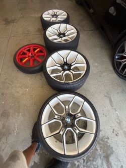 22 inch Staggered Rims with tires.