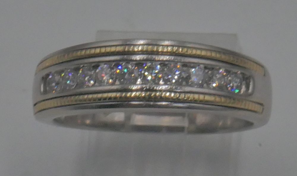 10kt white gold ring w 10 diamonds 1 carat total 7mm wide 6.2 grams size 11.5. 879760-1. very good condition.