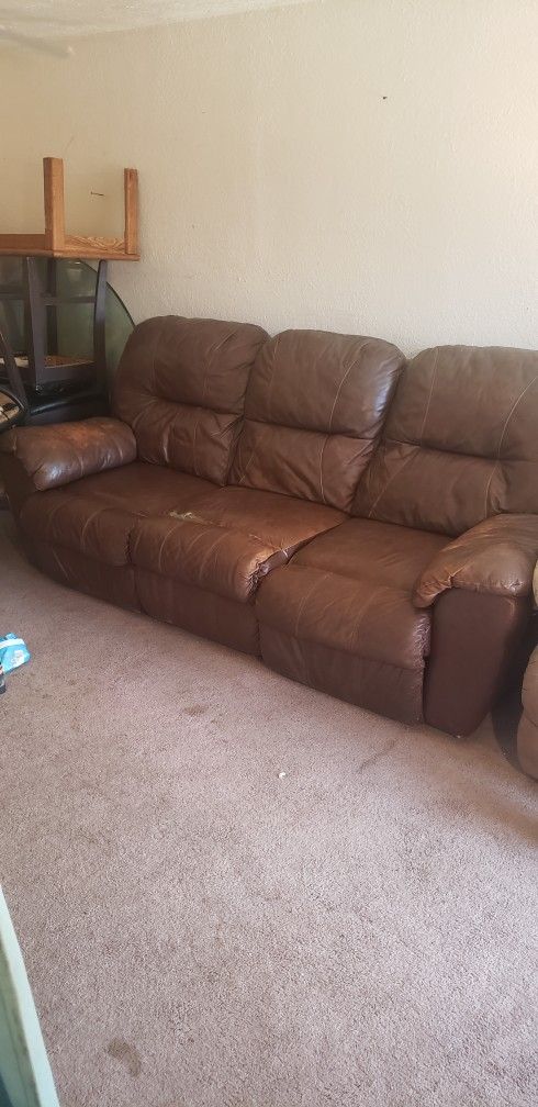 Used Double Reclining Leather Couch