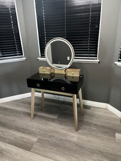 Black and Gold Mirror with Light Vanity